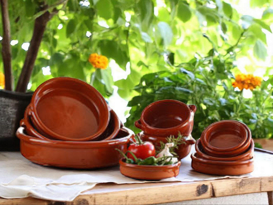 terracota pots lying on the wooden table